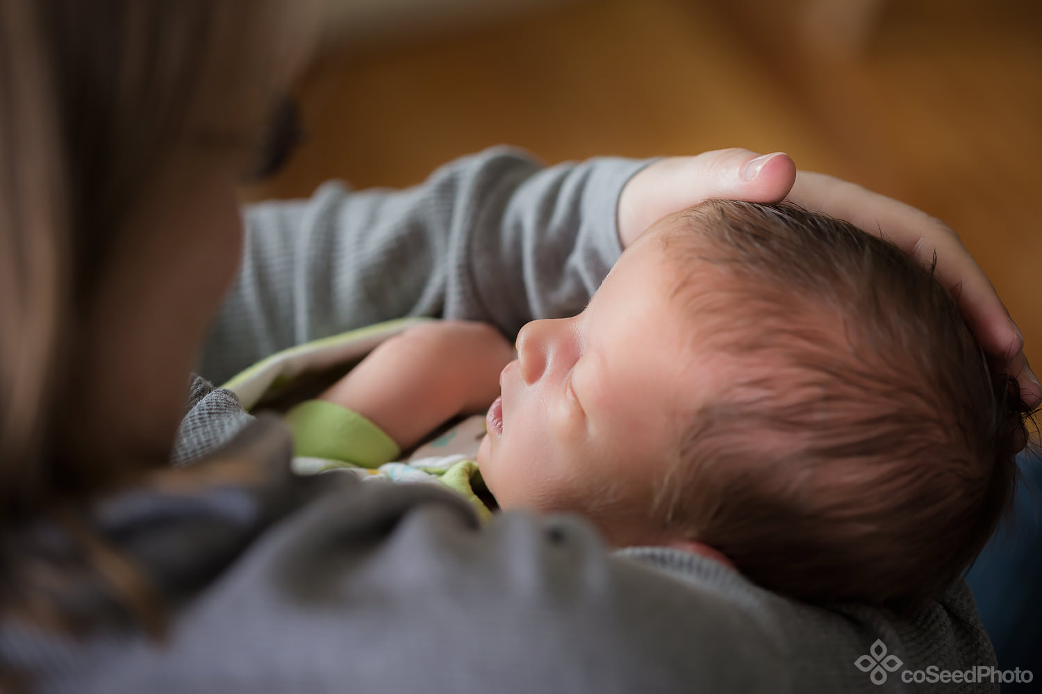 Nicole with hand on Declans head.